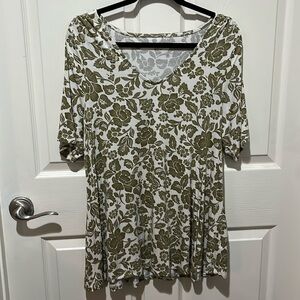 Lane Bryant off-white and olive green women’s top with a swing bottom